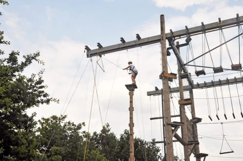 person on ropes course